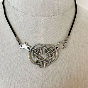Silver tone double dog knotted pendant necklace